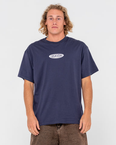 Man wearing Irie Eye Short Sleeve Tee in Navy Blue 2