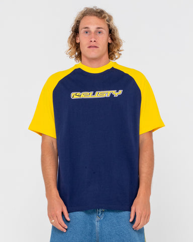 Man wearing Swaglan Raglan Short Sleeve Tee in Navy Blue / Yellow