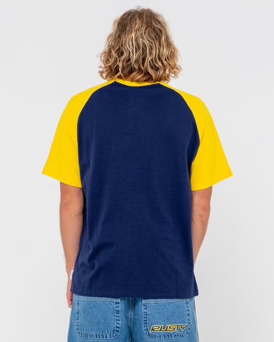 Man wearing Swaglan Raglan Short Sleeve Tee in Navy Blue / Yellow