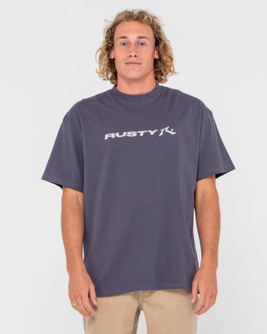 Man wearing Vital Rusty Short Sleeve Tee in Coal