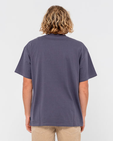 Man wearing Vital Rusty Short Sleeve Tee in Coal