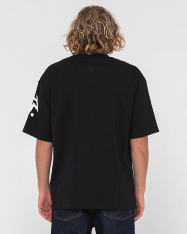 Man wearing Competition Revolution Short Sleeve Tee in Black