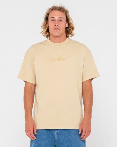 Man wearing Slowmo Washed Short Sleeve Tee in Light Khaki