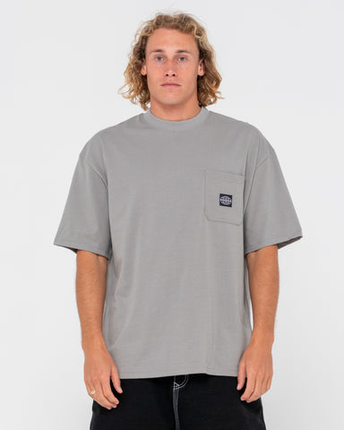 Man wearing Steezey Short Sleeve Heavy Tee in Frost Grey