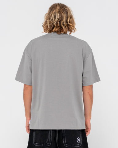 Man wearing Steezey Short Sleeve Heavy Tee in Frost Grey