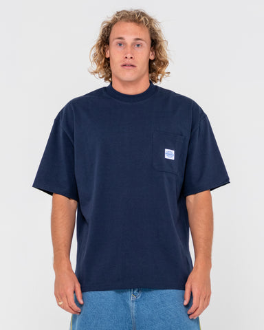 Man wearing Steezey Short Sleeve Heavy Tee in Navy Blue