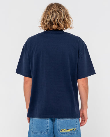 Man wearing Steezey Short Sleeve Heavy Tee in Navy Blue