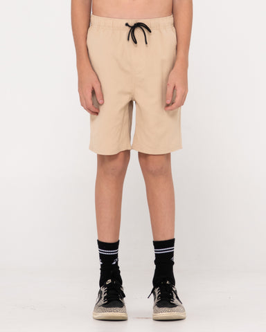 Boy wearing Overtone Elastic Short Boys in Light Fennel