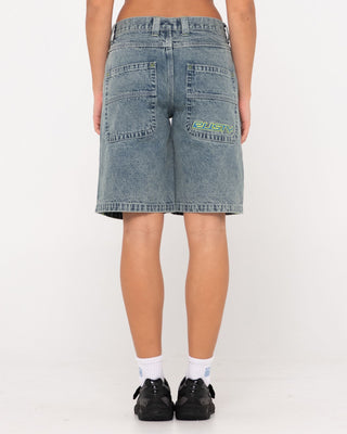 Woman wearing Flip Mommy Low Rise Wide Leg Denim Short in Dirty Dawg / Lime