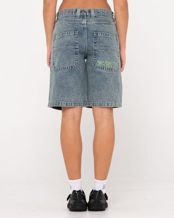 woman-wearing-flip-mommy-low-rise-wide-leg-denim-short-in-dirty-dawg-lime