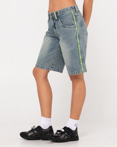 Woman wearing Flip Mommy Low Rise Wide Leg Denim Short in Dirty Dawg / Lime