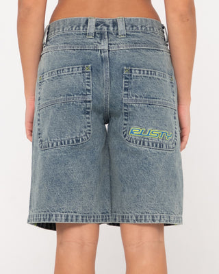 Woman wearing Flip Mommy Low Rise Wide Leg Denim Short in Dirty Dawg / Lime