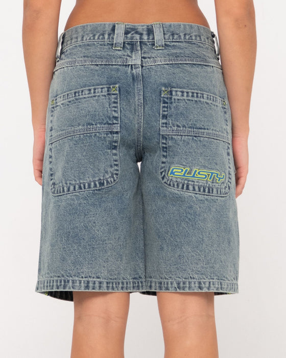 woman-wearing-flip-mommy-low-rise-wide-leg-denim-short-in-dirty-dawg-lime