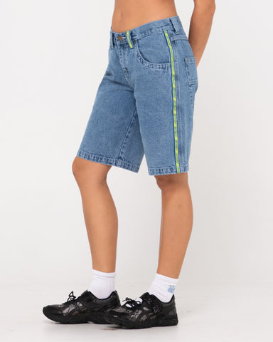 Woman wearing Flip Mommy Low Rise Wide Leg Denim Short in Middy Blue / Lime