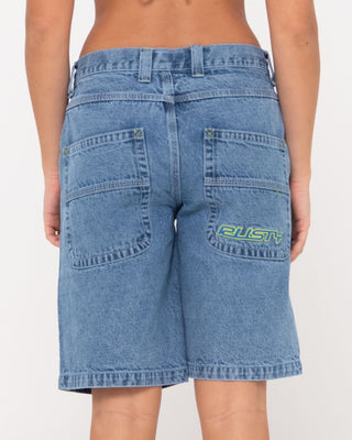 Woman wearing Flip Mommy Low Rise Wide Leg Denim Short in Middy Blue / Lime