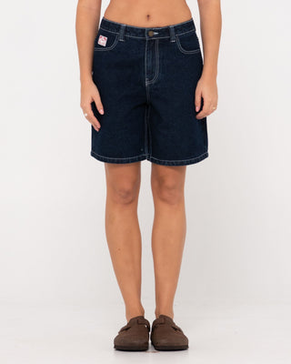 Woman wearing High Volume 18 Inch Denim Jort in Deep Blue