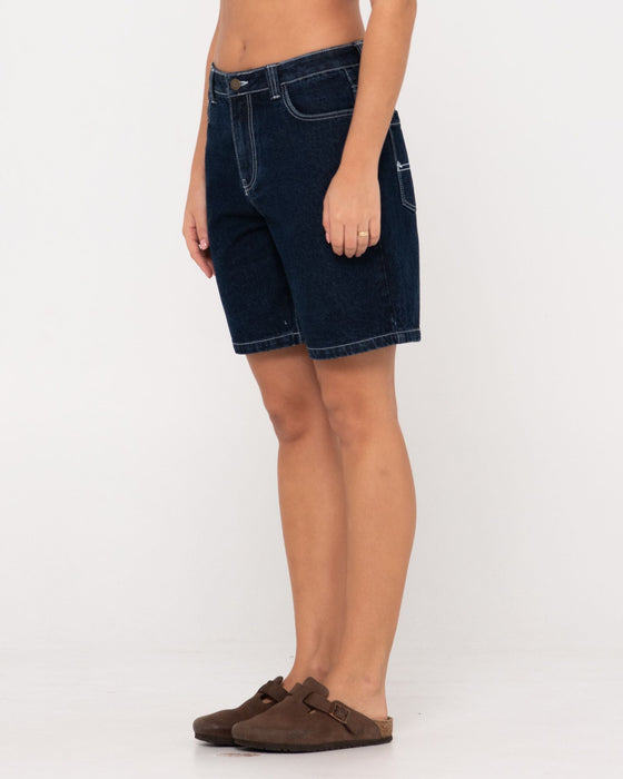 woman-wearing-high-volume-18-inch-denim-jort-in-deep-blue