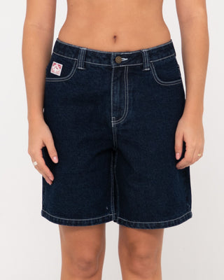 Woman wearing High Volume 18 Inch Denim Jort in Deep Blue