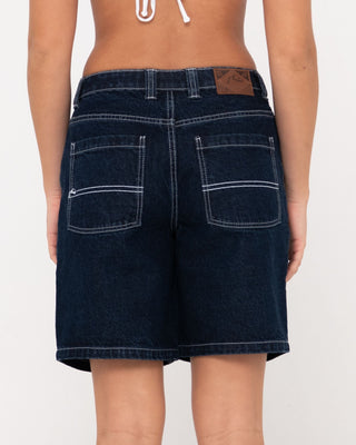 Woman wearing High Volume 18 Inch Denim Jort in Deep Blue