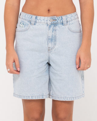 Woman wearing High Volume 18 Inch Denim Jort in Sky Blue Heather