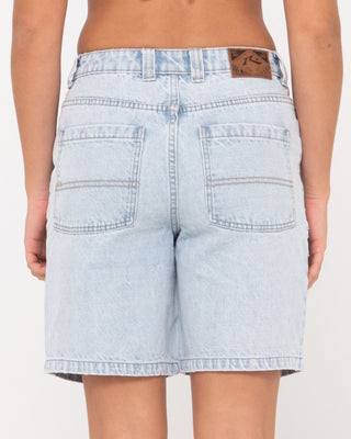 Woman wearing High Volume 18 Inch Denim Jort in Sky Blue Heather