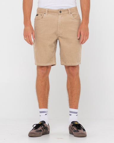 Man wearing Rifts 5 Pkt Short in Light Fennel