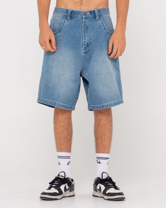 man-wearing-flip-daddy-tapeless-jort-middy-blue-in-middy-blue-1