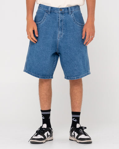 Man wearing Flip Daddy Tapeless Jort - Middy Blue in Middy Blue