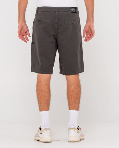 Man wearing Worldwide Pleat Guy Short in Coal