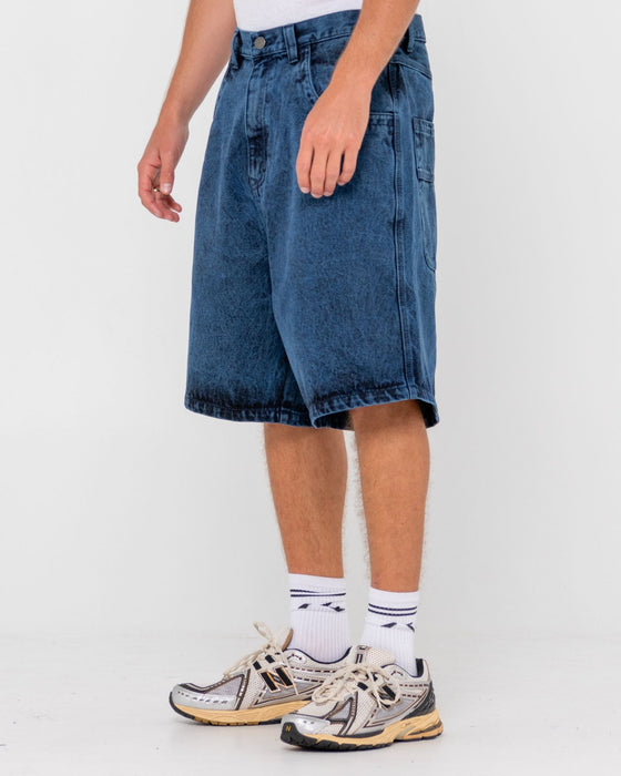 man-wearing-r-dot-baggy-overdye-jort-in-blue