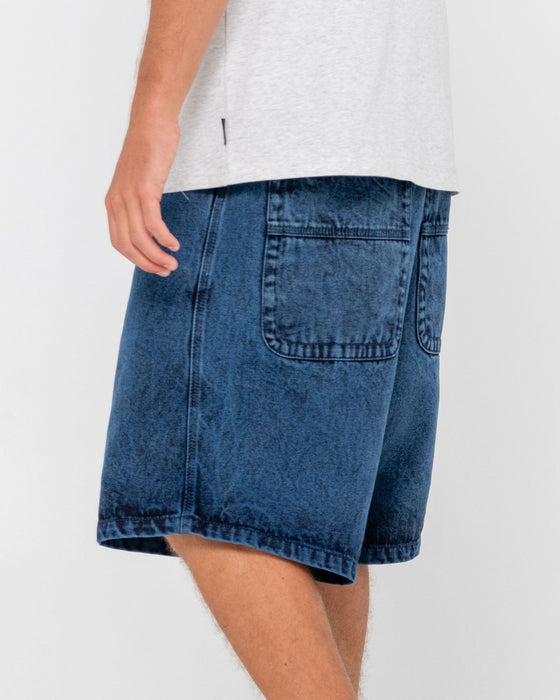man-wearing-r-dot-baggy-overdye-jort-in-blue