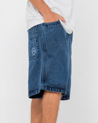 Man wearing R Dot Baggy Overdye Jort in Blue