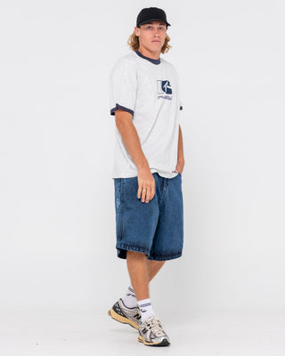 Man wearing R Dot Baggy Overdye Jort in Blue