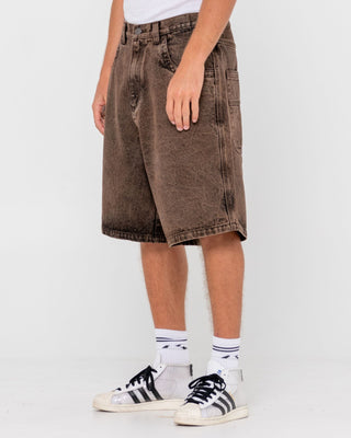 Man wearing R Dot Baggy Overdye Jort in Brown