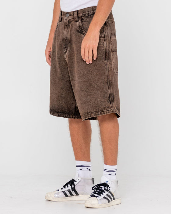 man-wearing-r-dot-baggy-overdye-jort-in-brown