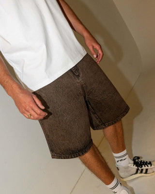Man wearing R Dot Baggy Overdye Jort in Brown