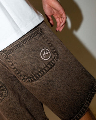 Man wearing R Dot Baggy Overdye Jort in Brown