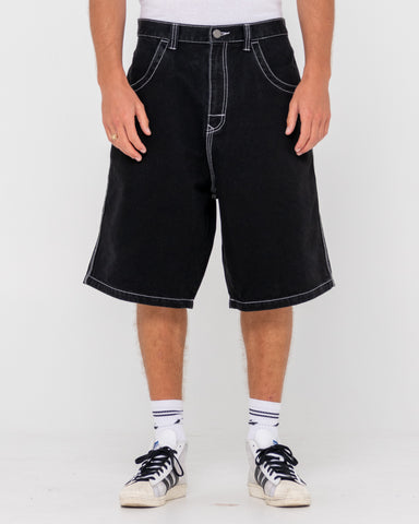 Man wearing R Dot Baggy Jort - Black Out in Black Out