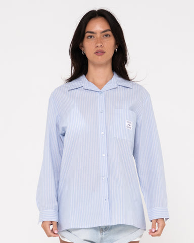 Woman wearing Ava Stripe Oversized Shirt in Celestial Blue