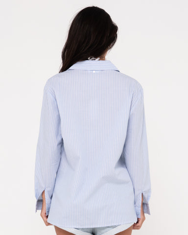 Woman wearing Ava Stripe Oversized Shirt in Celestial Blue