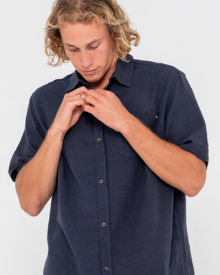 Man wearing Overtone Short Sleeve Linen Shirt in Navy Blue