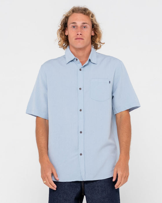 man-wearing-overtone-short-sleeve-linen-shirt-in-sky-blue