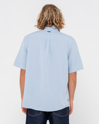 Man wearing Overtone Short Sleeve Linen Shirt in Sky Blue