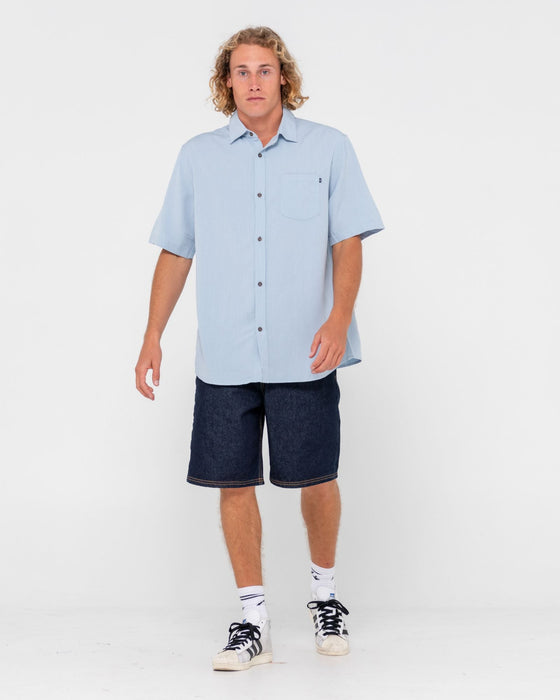man-wearing-overtone-short-sleeve-linen-shirt-in-sky-blue