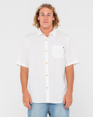 Man wearing Overtone Short Sleeve Linen Shirt in Whisper White