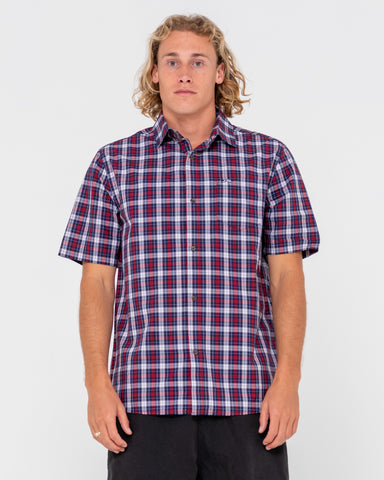 Man wearing Datsun Check Short Sleeve Shirt in True Red