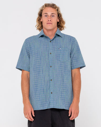 Man wearing Datsun Drop Short Sleeve Shirt in China Blue