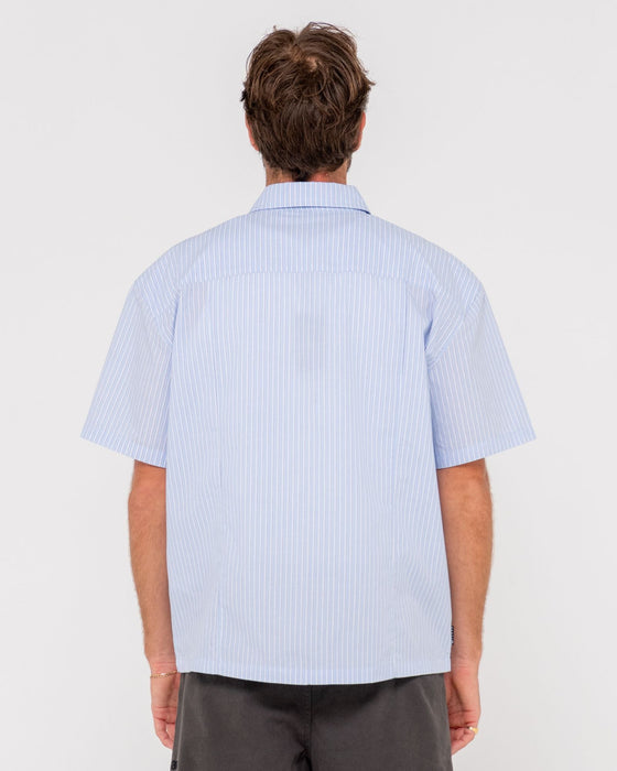 man-wearing-boxed-in-short-sleeve-shirt-in-sky-blue