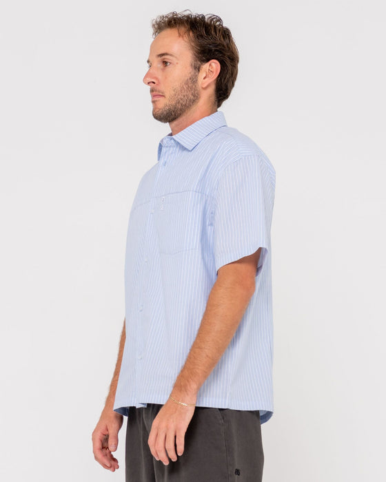 man-wearing-boxed-in-short-sleeve-shirt-in-sky-blue