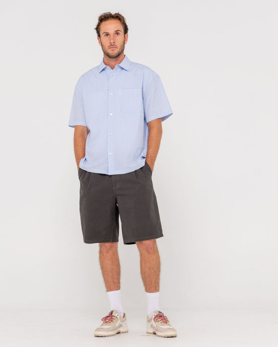 man-wearing-boxed-in-short-sleeve-shirt-in-sky-blue